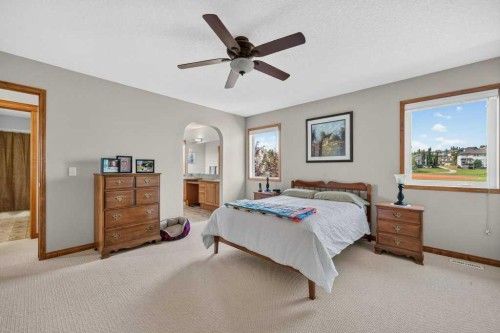 10 Westmount Road, Okotoks, AB - Indoor Photo Showing Bedroom