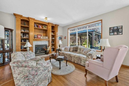 10 Westmount Road, Okotoks, AB - Indoor Photo Showing Living Room With Fireplace