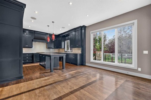 4 Aspen Cliff Close Sw, Calgary, AB - Indoor Photo Showing Kitchen With Upgraded Kitchen