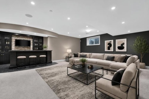 4 Aspen Cliff Close Sw, Calgary, AB - Indoor Photo Showing Living Room