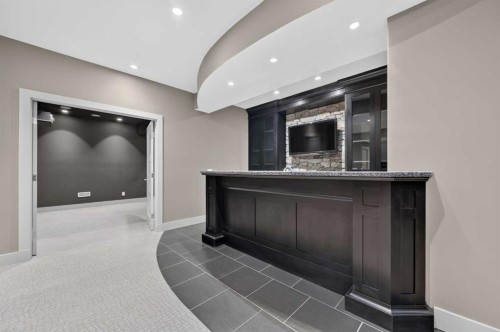 4 Aspen Cliff Close Sw, Calgary, AB - Indoor Photo Showing Other Room