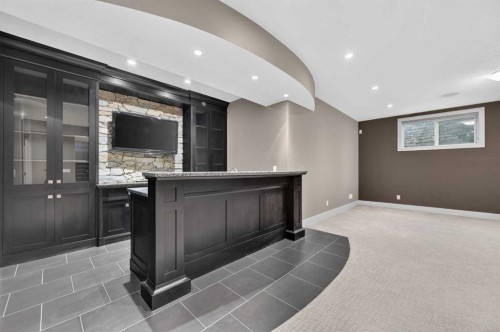 4 Aspen Cliff Close Sw, Calgary, AB - Indoor Photo Showing Other Room