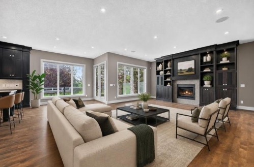 4 Aspen Cliff Close Sw, Calgary, AB - Indoor Photo Showing Living Room With Fireplace