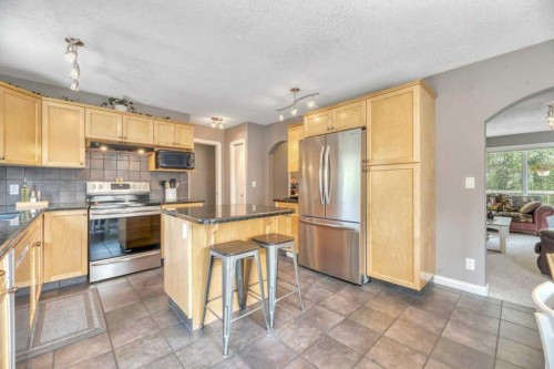 3 Grande Point Estates, Strathmore, AB - Indoor Photo Showing Kitchen With Double Sink