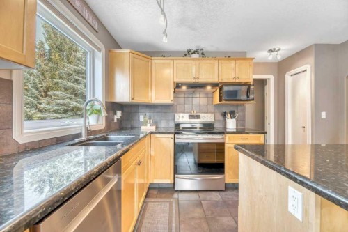 3 Grande Point Estates, Strathmore, AB - Indoor Photo Showing Kitchen With Double Sink