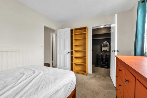 151 Midbend Place Se, Calgary, AB - Indoor Photo Showing Bedroom