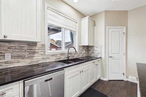 83 Redstone Gardens Ne, Calgary, AB - Indoor Photo Showing Kitchen With Double Sink With Upgraded Kitchen