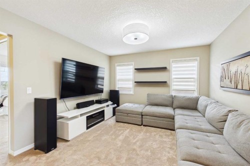 83 Redstone Gardens Ne, Calgary, AB - Indoor Photo Showing Living Room