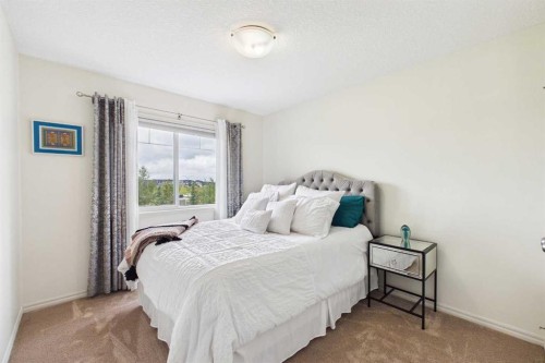 83 Redstone Gardens Ne, Calgary, AB - Indoor Photo Showing Bedroom