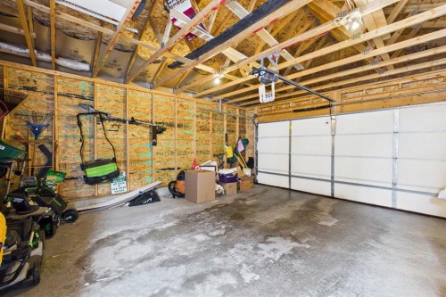 83 Redstone Gardens Ne, Calgary, AB - Indoor Photo Showing Garage