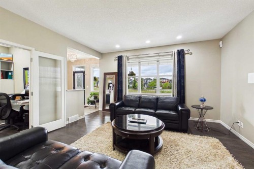 83 Redstone Gardens Ne, Calgary, AB - Indoor Photo Showing Living Room