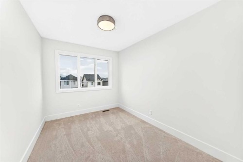 270 Greystone Boulevard, Cochrane, AB - Indoor Photo Showing Other Room