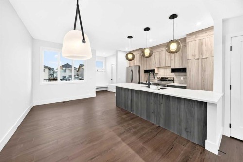 270 Greystone Boulevard, Cochrane, AB - Indoor Photo Showing Kitchen With Upgraded Kitchen