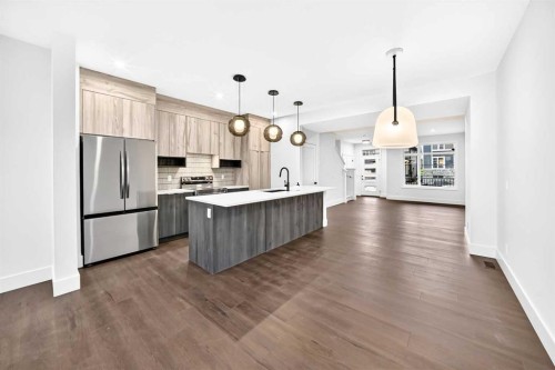 270 Greystone Boulevard, Cochrane, AB - Indoor Photo Showing Kitchen With Upgraded Kitchen