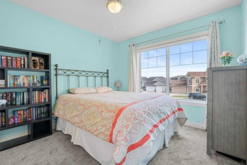 471 Canals Boulevard Sw, Airdrie, AB - Indoor Photo Showing Bedroom