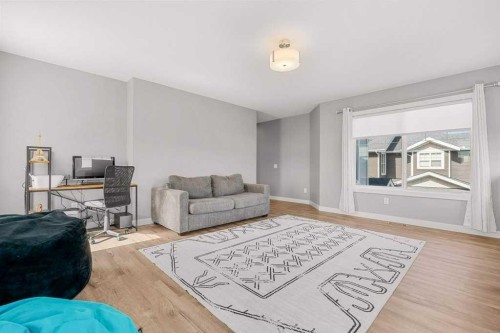 471 Canals Boulevard Sw, Airdrie, AB - Indoor Photo Showing Living Room