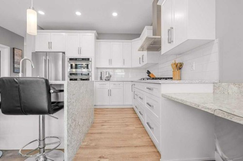 471 Canals Boulevard Sw, Airdrie, AB - Indoor Photo Showing Kitchen With Upgraded Kitchen