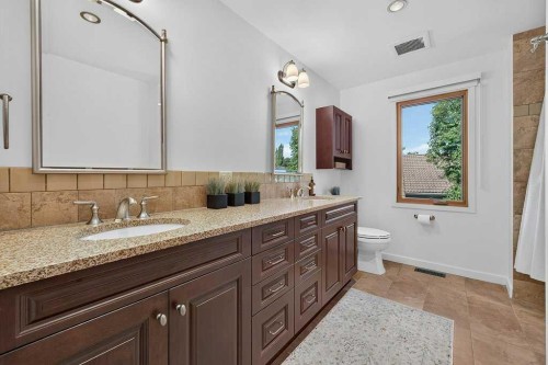 15 Woodacres Way Sw, Calgary, AB 