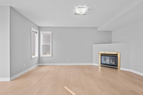 187 Martinvalley Crescent Ne, Calgary, AB - Indoor With Fireplace