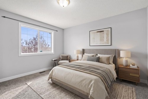 187 Martinvalley Crescent Ne, Calgary, AB - Indoor Photo Showing Bedroom