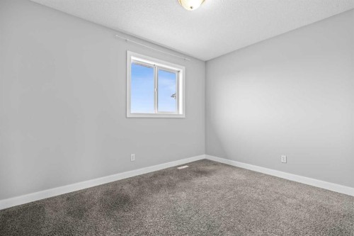 187 Martinvalley Crescent Ne, Calgary, AB - Indoor Photo Showing Other Room