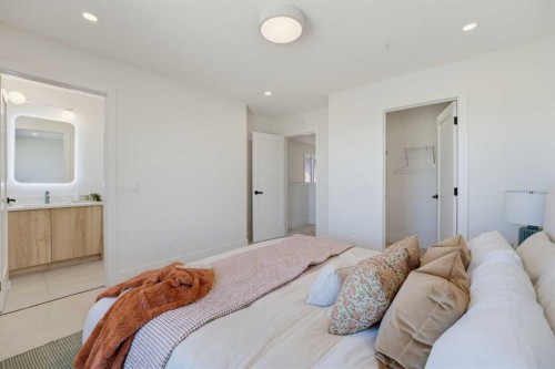 266 Greystone Boulevard, Cochrane, AB - Indoor Photo Showing Bedroom