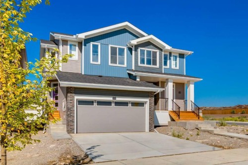 266 Greystone Boulevard, Cochrane, AB - Outdoor With Facade