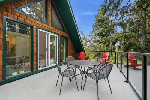 725 Calkins Place, Diamond Valley, AB - Outdoor With Deck Patio Veranda With Exterior