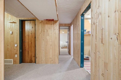 725 Calkins Place, Diamond Valley, AB - Indoor Photo Showing Other Room