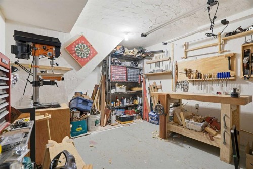 725 Calkins Place, Diamond Valley, AB - Indoor Photo Showing Garage