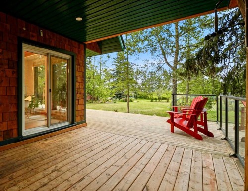 725 Calkins Place, Diamond Valley, AB - Outdoor With Deck Patio Veranda With Exterior