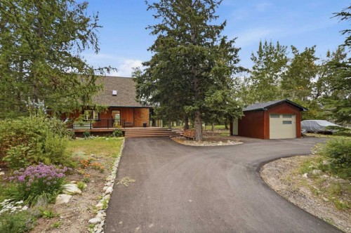725 Calkins Place, Diamond Valley, AB - Outdoor With Deck Patio Veranda