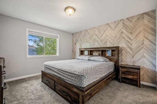 163 West Lakeview Passage, Chestermere, AB - Indoor Photo Showing Bedroom
