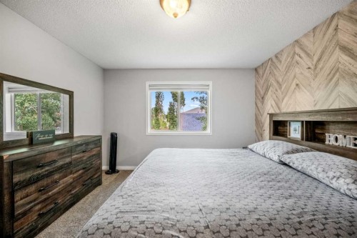 163 West Lakeview Passage, Chestermere, AB - Indoor Photo Showing Bedroom