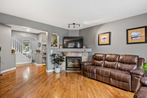 163 West Lakeview Passage, Chestermere, AB - Indoor Photo Showing Living Room With Fireplace
