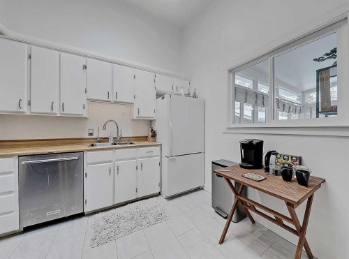 247 Simons Road Nw, Calgary, AB - Indoor Photo Showing Kitchen With Double Sink