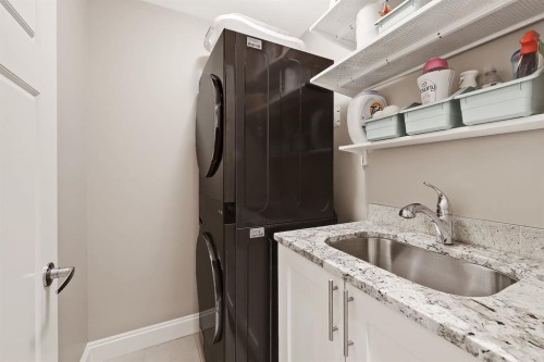 2639 27 Street Sw, Calgary, AB - Indoor Photo Showing Laundry Room