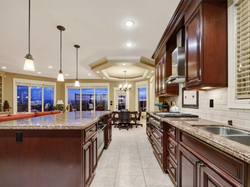 3221 77 Street Sw, Calgary, AB - Indoor Photo Showing Kitchen With Double Sink With Upgraded Kitchen