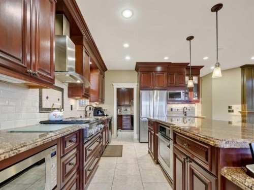 3221 77 Street Sw, Calgary, AB - Indoor Photo Showing Kitchen With Upgraded Kitchen