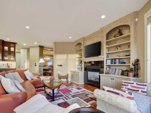 3221 77 Street Sw, Calgary, AB - Indoor Photo Showing Living Room With Fireplace