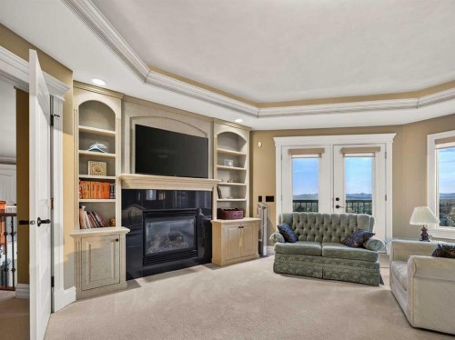 3221 77 Street Sw, Calgary, AB - Indoor Photo Showing Living Room With Fireplace