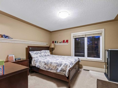 3221 77 Street Sw, Calgary, AB - Indoor Photo Showing Bedroom