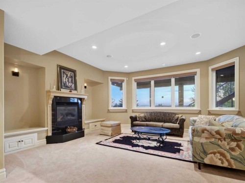 3221 77 Street Sw, Calgary, AB - Indoor Photo Showing Living Room With Fireplace