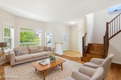 459 Evermeadow Road Sw, Calgary, AB - Indoor Photo Showing Living Room