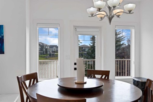 1125 Channelside Drive Sw, Airdrie, AB - Indoor Photo Showing Dining Room