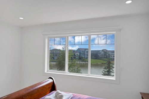1125 Channelside Drive Sw, Airdrie, AB - Indoor Photo Showing Bedroom