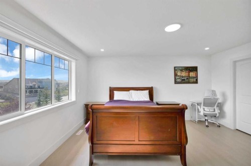 1125 Channelside Drive Sw, Airdrie, AB - Indoor Photo Showing Bedroom