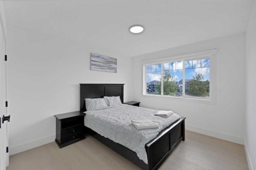 1125 Channelside Drive Sw, Airdrie, AB - Indoor Photo Showing Bedroom