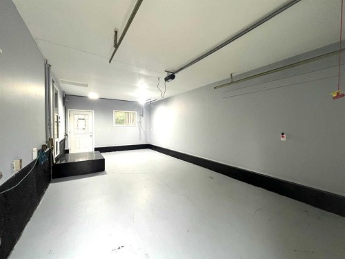 11 Huntstrom Place Ne, Calgary, AB - Indoor Photo Showing Garage