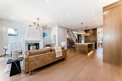 1610 49 Avenue Sw, Calgary, AB - Indoor Photo Showing Living Room With Fireplace